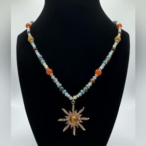Vibrant Beaded Necklace with Sunburst Pendant